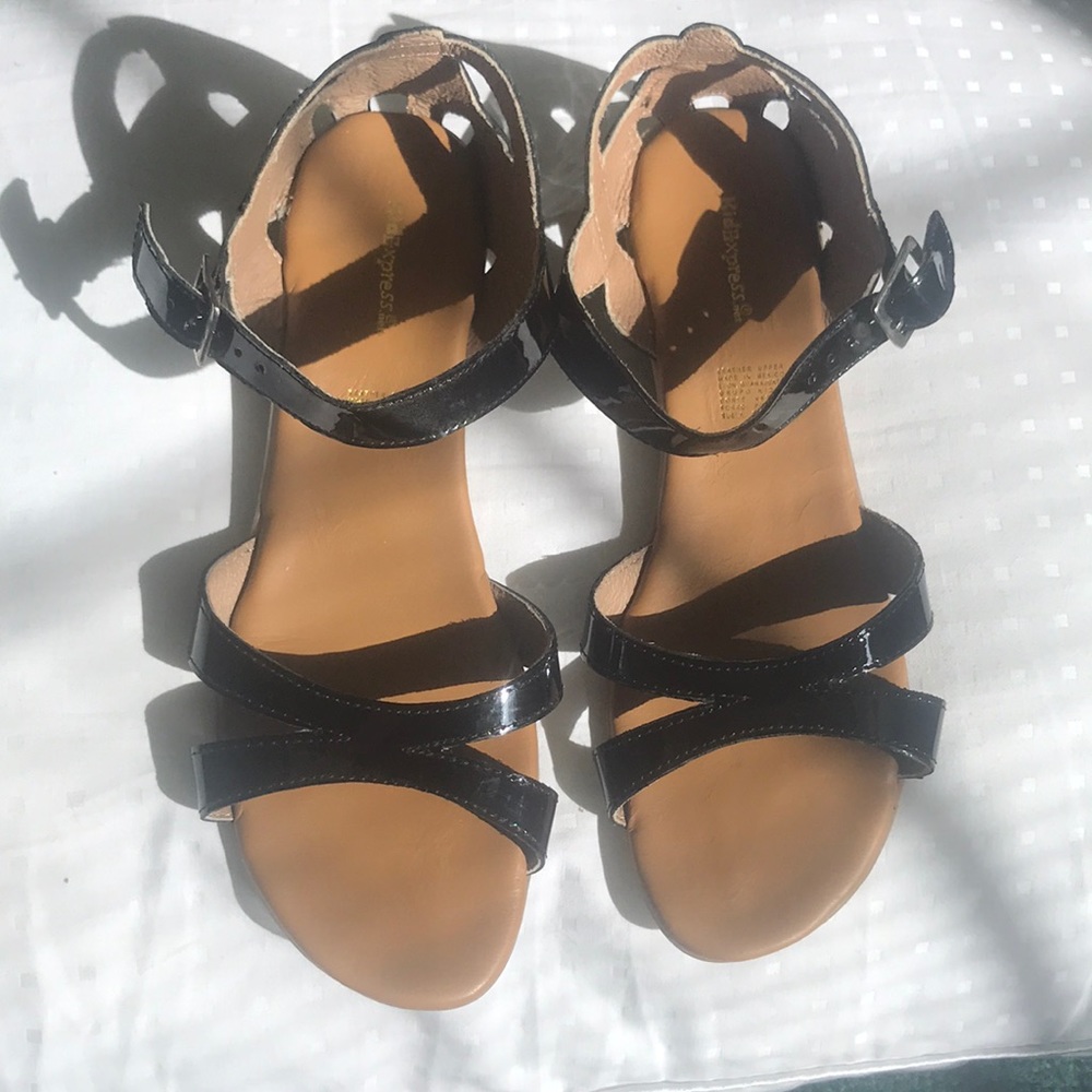Kids express black  sandals.